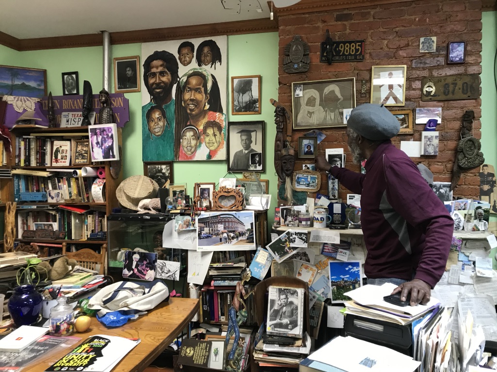 Photo of Richard Green in his Crown Heights office. 
